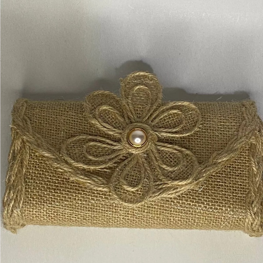 Elegant Tan Clutch with Floral Design